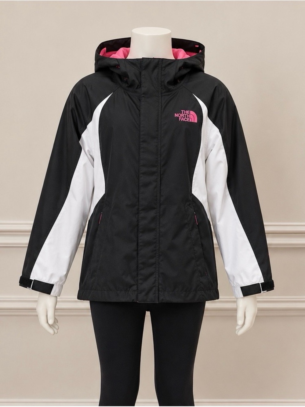 The North Face Black & White Hooded Kids' Rain Jacket with Pink Accents